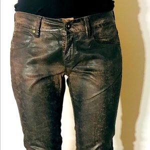 Leather like fabric jeans. Made in Italy